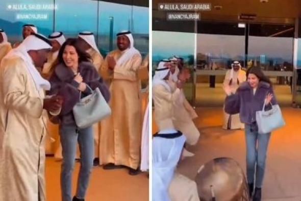 تراند اليوم : شاهد .. نانسي عجرم تشارك فرق شعبية الرقص أثناء استقبالها لحظة وصولها