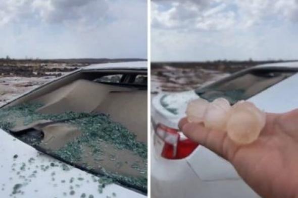 تراند اليوم : شاهد.. حبات البرد تحطم زجاج سيارتين في وادي النقيع بالمدينة