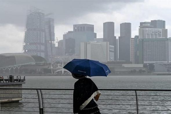 أمطار غزيرة في سنغافورة وتحذيرات من حدوث فيضانات في عدة مناطق