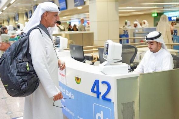 الامارات | «إقامة دبي» تستقبل الحجاج بختم «الإمارات ترحب بعودتكم»
